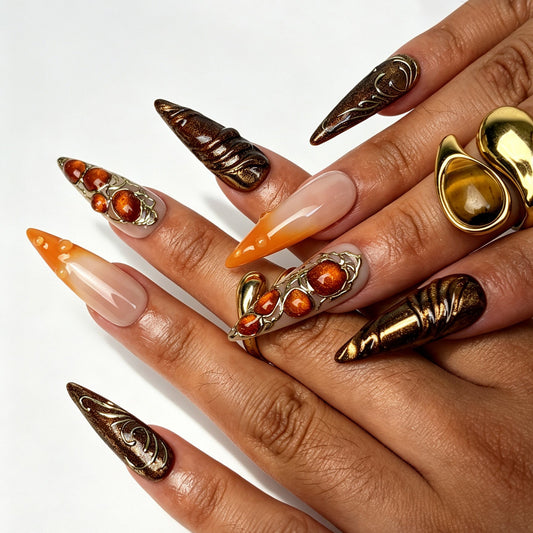 Amber Ember handmade stiletto press on nails, bold orange amber boho-luxury nail art on hand