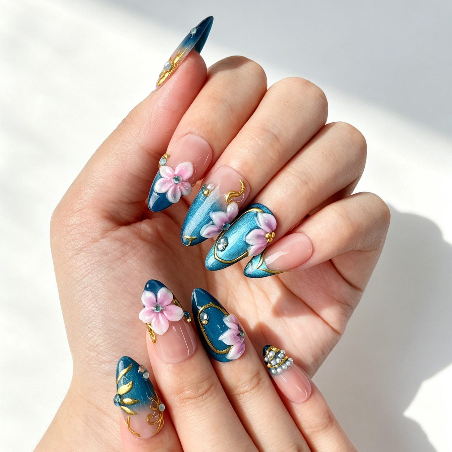 Close Up 3D Embossed Nail Art, Oriental Pink Floral Gold Line Rhinestone Decor, Medium Almond Blue Gradient Press On Nail Detail Shot