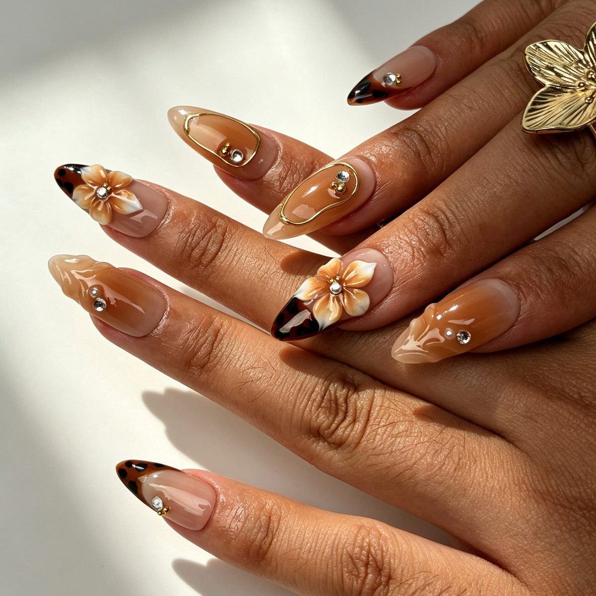 Amber Bloom handmade almond press on nails, soft romantic brown flower white French tip nail art on hand