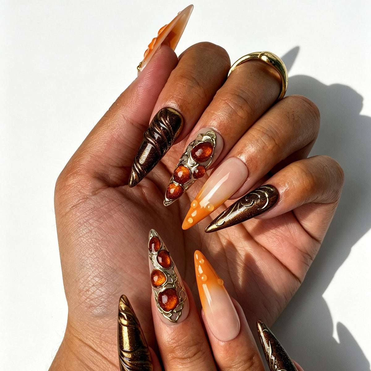 Handcrafted stiletto press on nails, bold orange amber design for fall events, photoshoots and boho styling