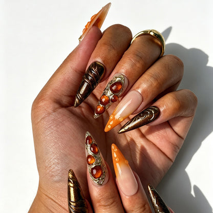 Handcrafted stiletto press on nails, bold orange amber design for fall events, photoshoots and boho styling