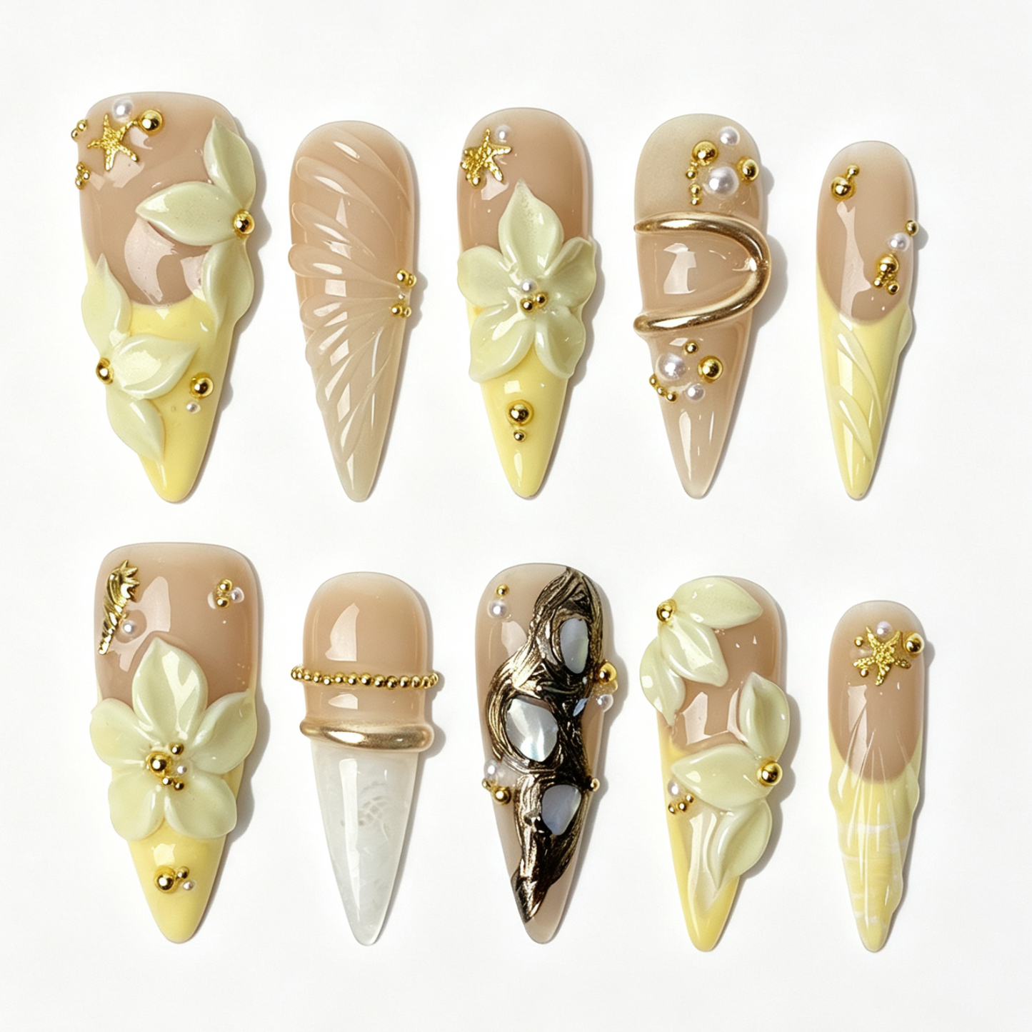 Cream Bloom long stiletto press on nails, nude cream gradient with ivory sculpted flower, gold metal line and tiny rhinestone decor