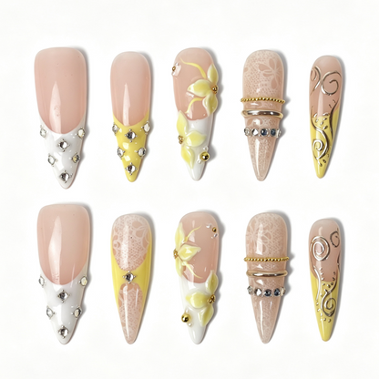 Lemon Lace salon-grade long stiletto nail set, spring lace floral design with pale yellow 3D blooms and cluster clear rhinestones