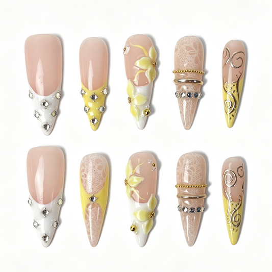 Lemon Lace salon-grade long stiletto nail set, spring lace floral design with pale yellow 3D blooms and cluster clear rhinestones