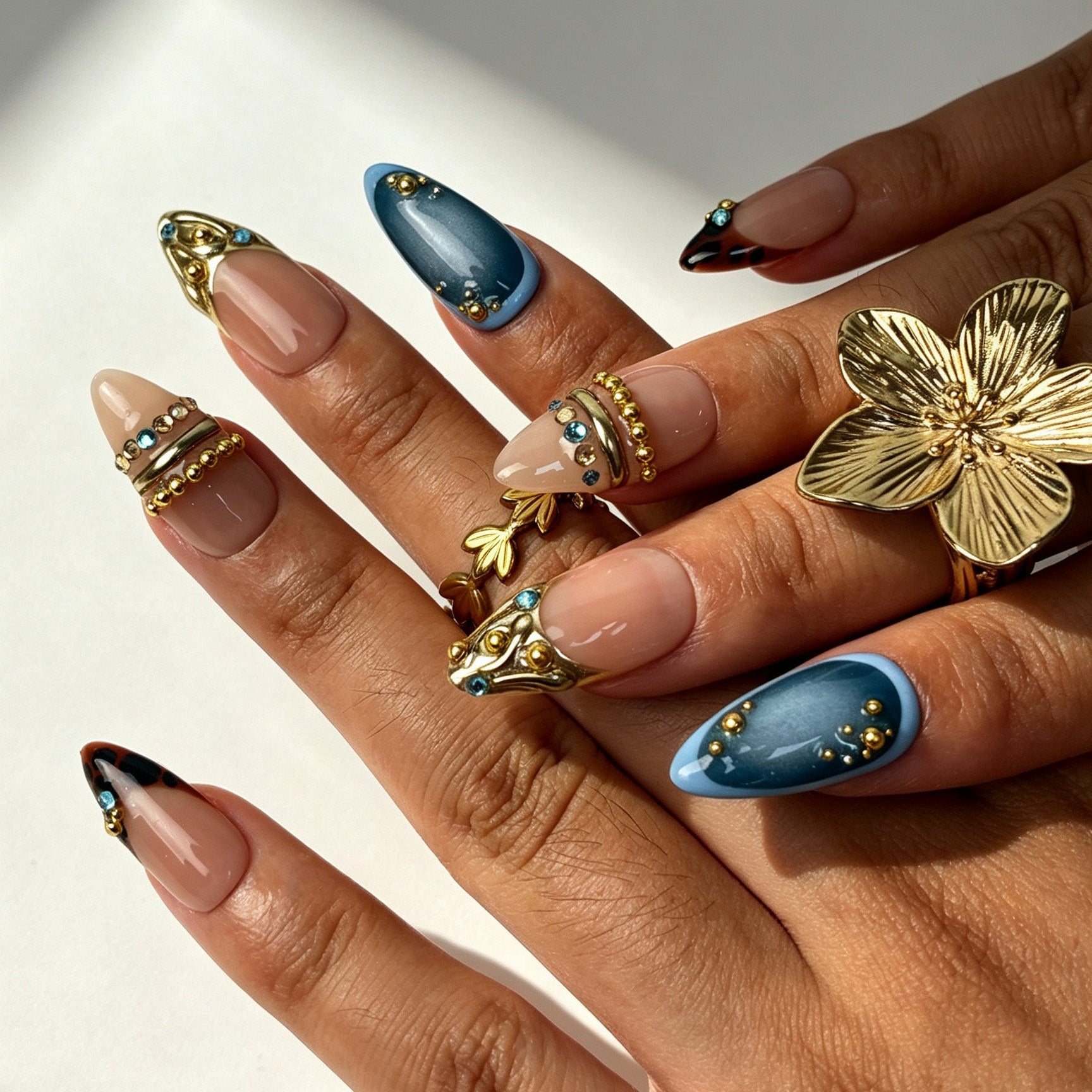 Luxury reusable almond press‑on nails, cat‑eye leopard design with champagne rhinestones