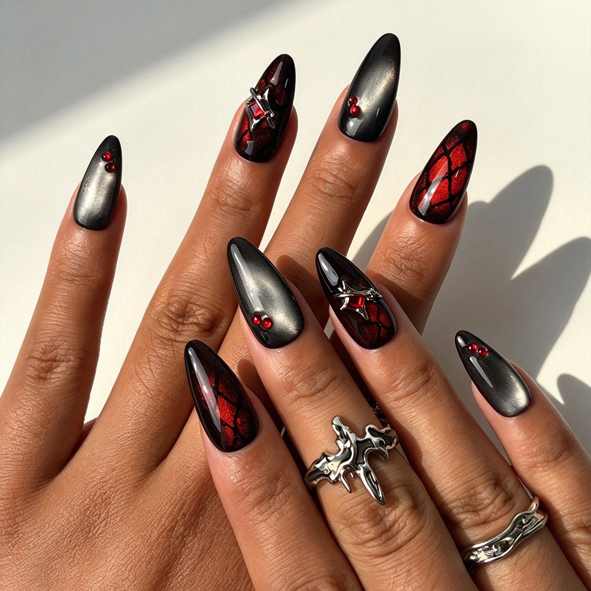 Handcrafted almond press on nails, moody black red cat eye Halloween bat nail design