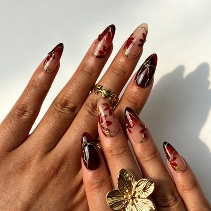 Vintage almond false nails, sheer nude base, wine red-black ombre, hand-painted maple leaf and gold wire