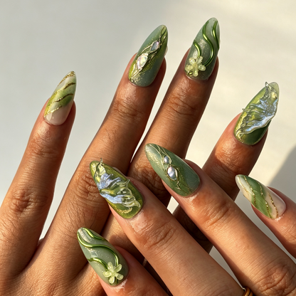 Jade Vein oriental wearable almond false nails, mint cat eye gradient, gold vein frame and translucent butterfly manicure