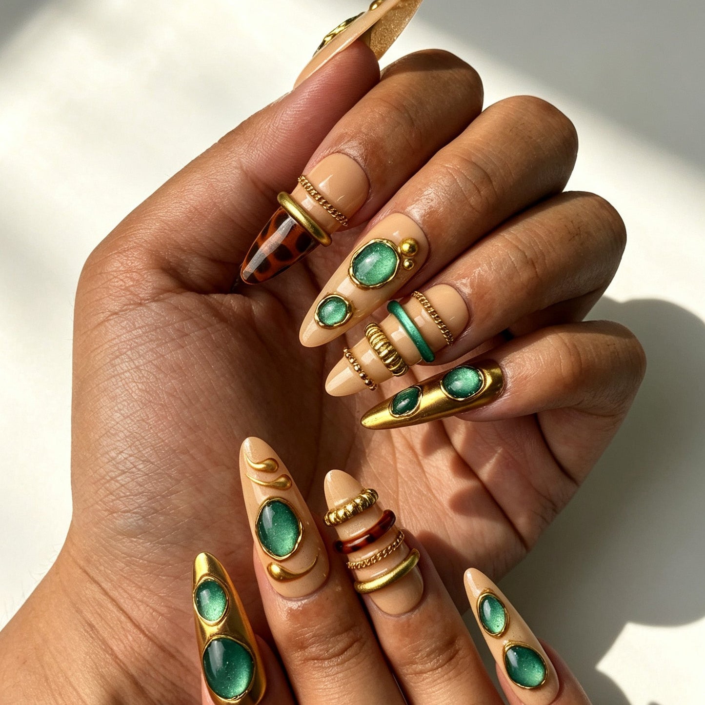 Emerald Regal handmade false nails long almond shape on natural hand