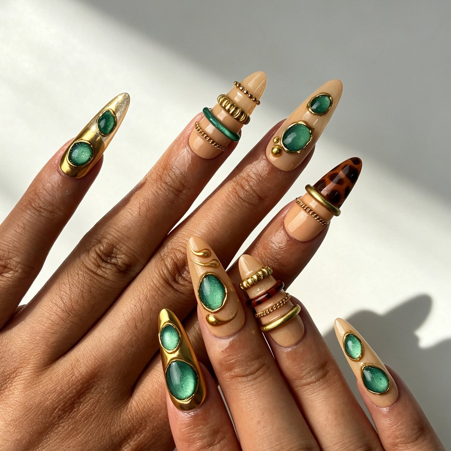 Vintage luxury nude almond press on nails emerald tortoiseshell manicure