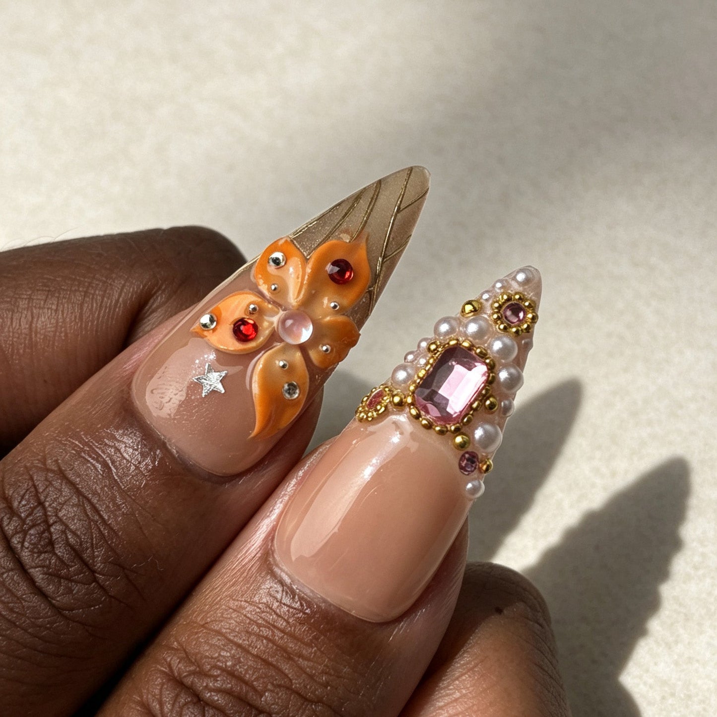 Peach Floris rhinestone pearl stiletto handmade press on nails on hand