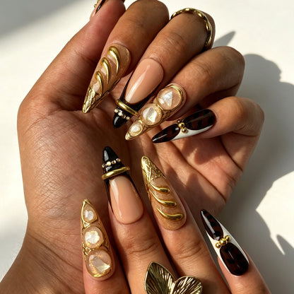Garnet Gild 3D gold shell fragment press‑on nails lifestyle shot