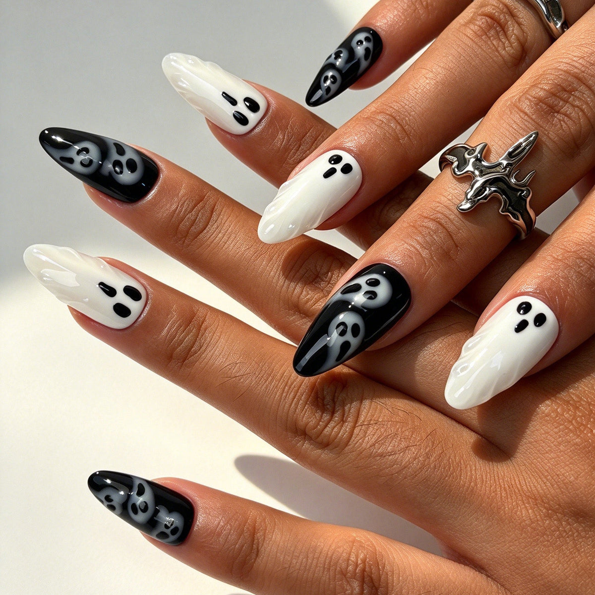 Handcrafted almond press on nails, playful cute ghost Halloween nail look