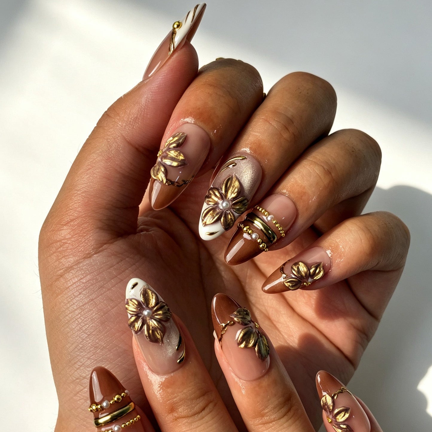 Hand‑crafted 3D gold‑bronze floral press‑on nails, gilded petal almond reusable false nails