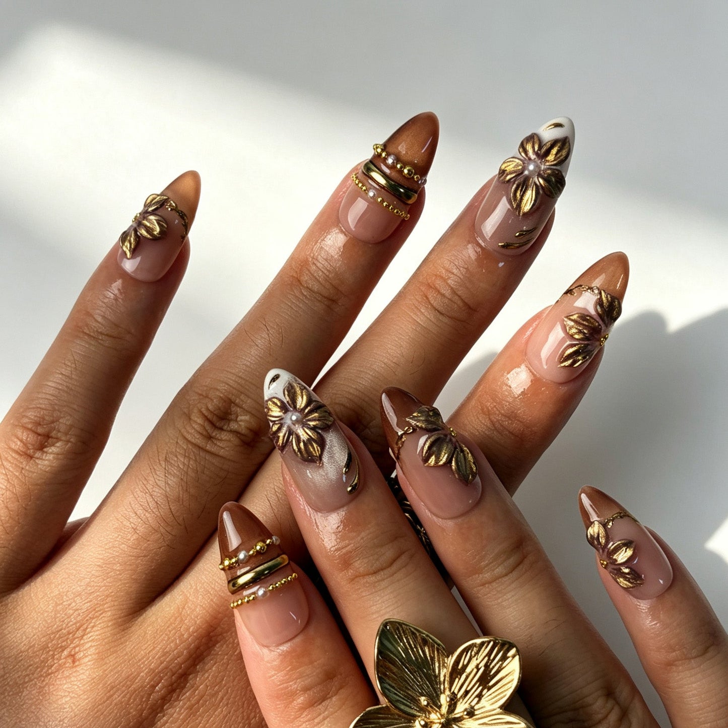 Vintage baroque gilded press‑on nails, medium almond nude false nails for dates and bridal styling