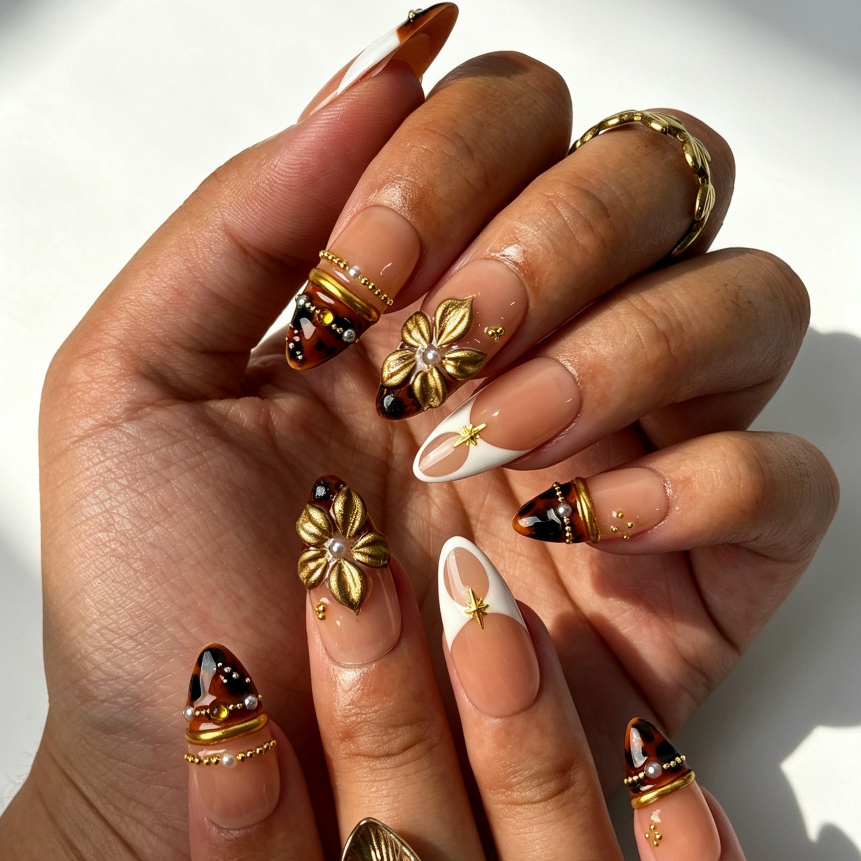 Gilded tortoise boho press‑on nails, medium almond tortoiseshell false nails for fall outfits