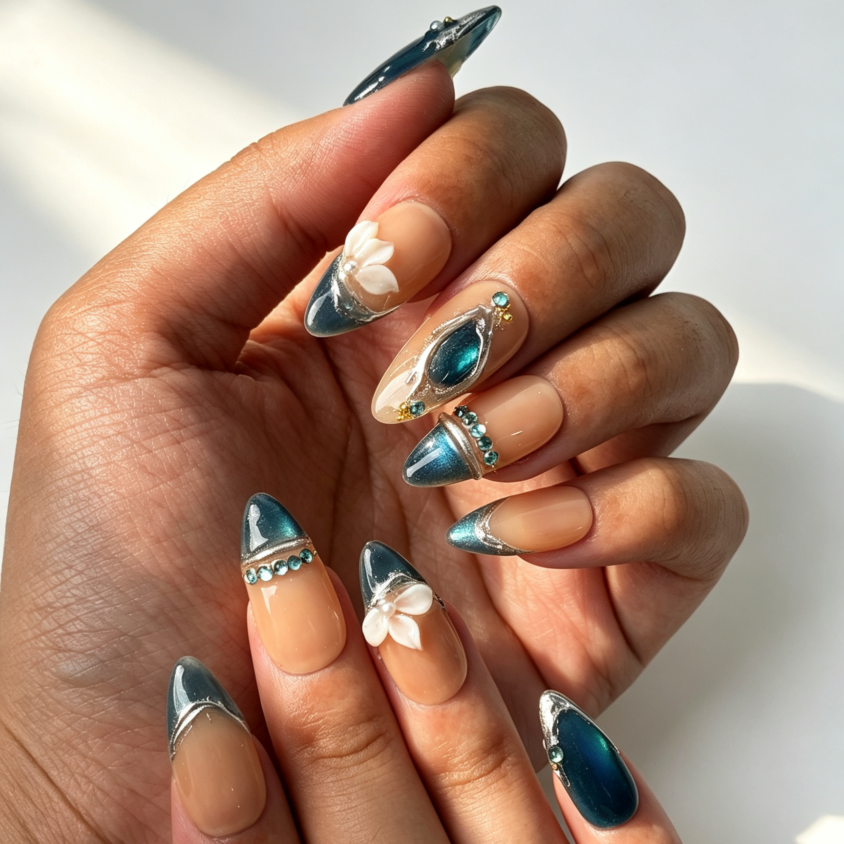 Jade Lotus Mirror teal jade cat eye almond press on nails worn on hand, silver foil white lotus elegant oriental nail art