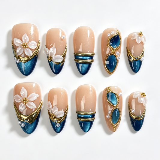 Teal Petal medium almond press on nails, nude teal cat eye french tip, hollow gilded frame, translucent white flower and pearl decor