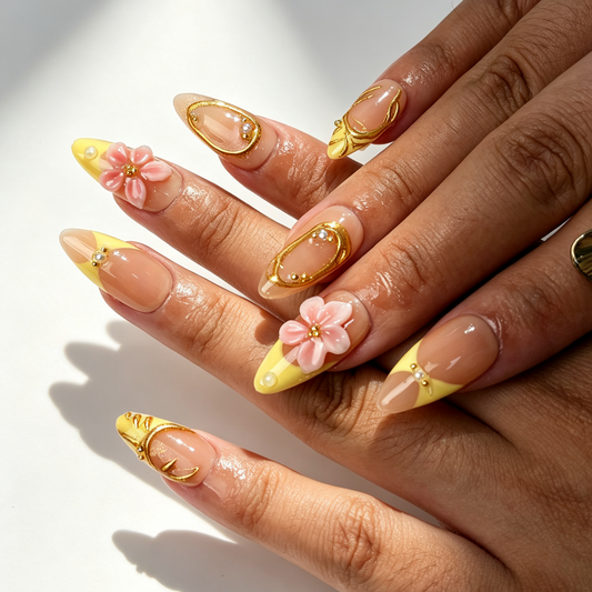 Handmade 3D pink blossom butter yellow press‑on nails on hand