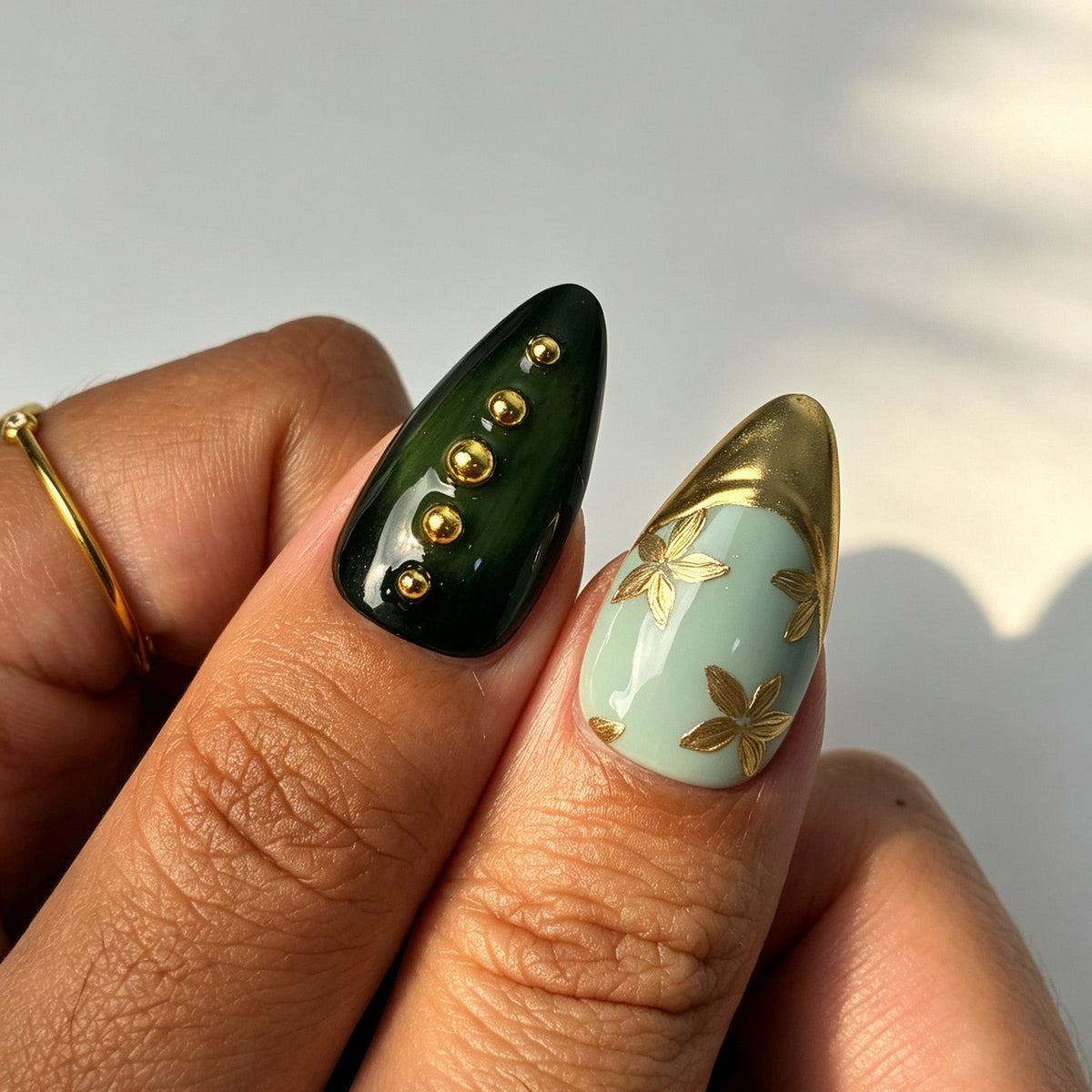 Elegant almond press on nails, emerald mint, amber gradient, gold foil, 3D flower, rhinestone and gold bead details