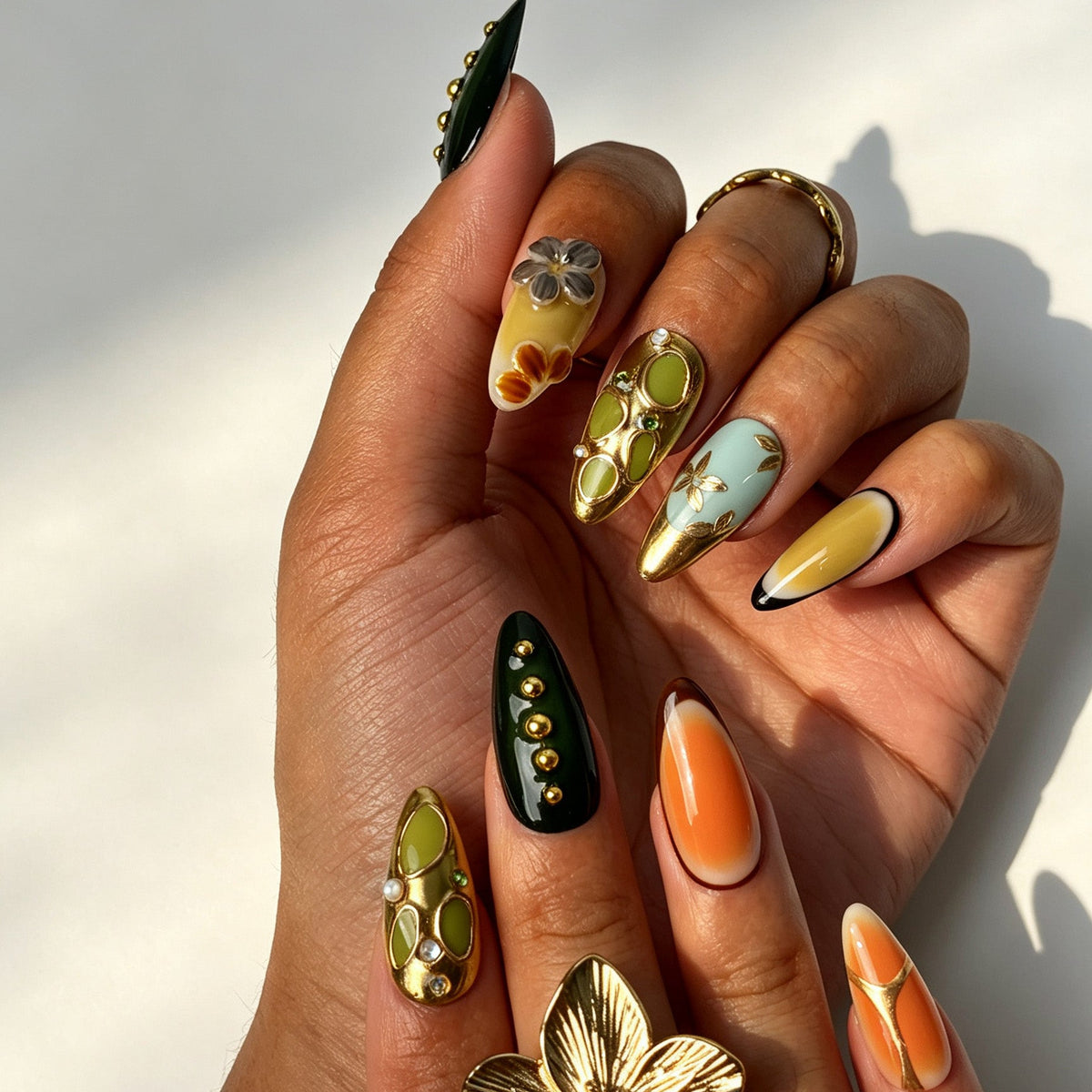 Handcrafted almond press on nails, elegant green amber 3D flower design for parties and photoshoots