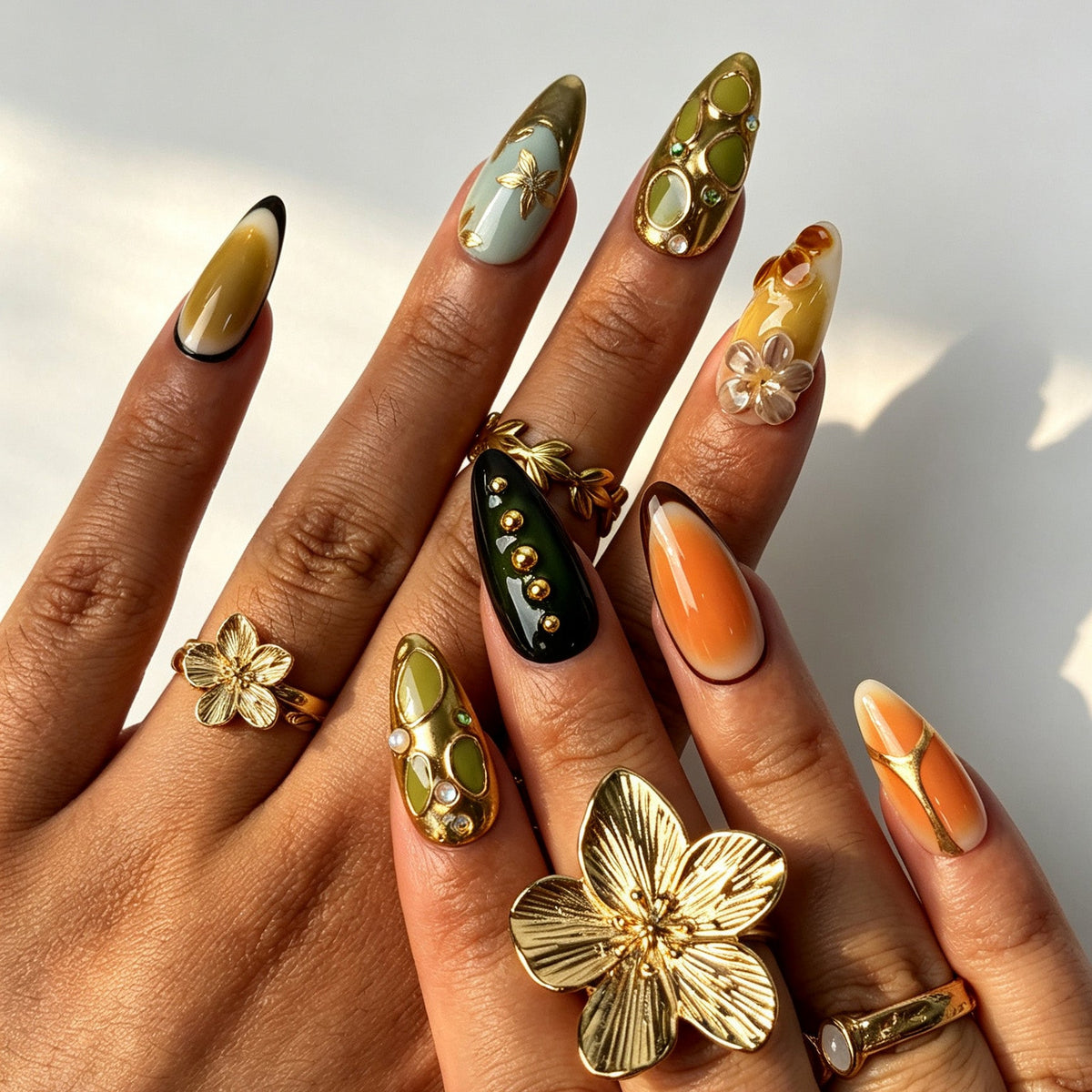 Vintage almond false nails, emerald mint base, amber gradient, gold foil accents and 3D floral details