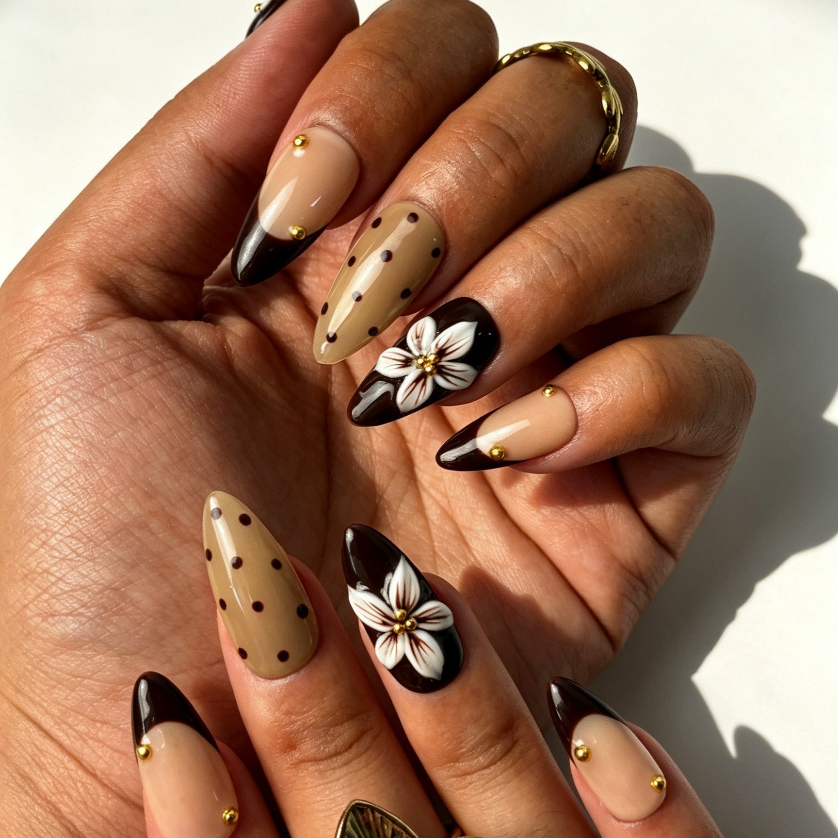 Retro mocha dot almond press‑on nails, chocolate brown nail set with gold bead flower detail