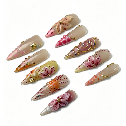 Peach Filigree spring fake nail set, sheer nude peach gradient base, sculpted floral, gold line and scattered clear rhinestone details