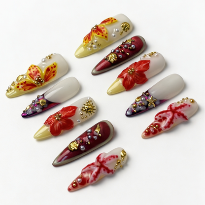 Coral Tide summer ocean fake nail set, dual white-coral gradient base, sculpted floral, sea shell starfish and pearl embellishments
