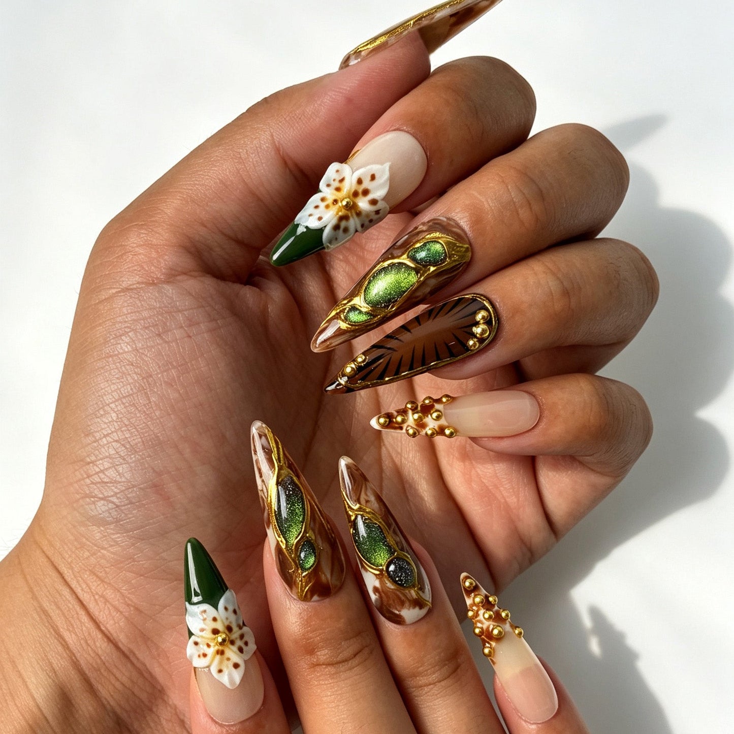 Close‑up handmade press‑on nails, sculpted 3D flower green glitter stone manicure