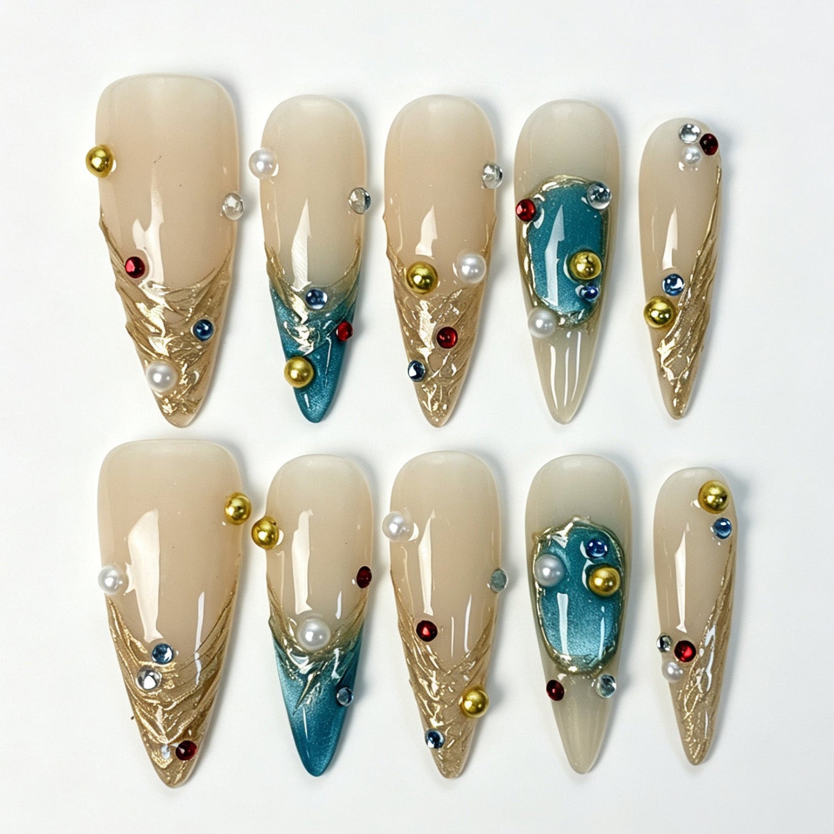 Long stiletto press‑on nails, nude teal gradient gilded‑texture gold pearl rhinestone luxury fake nails