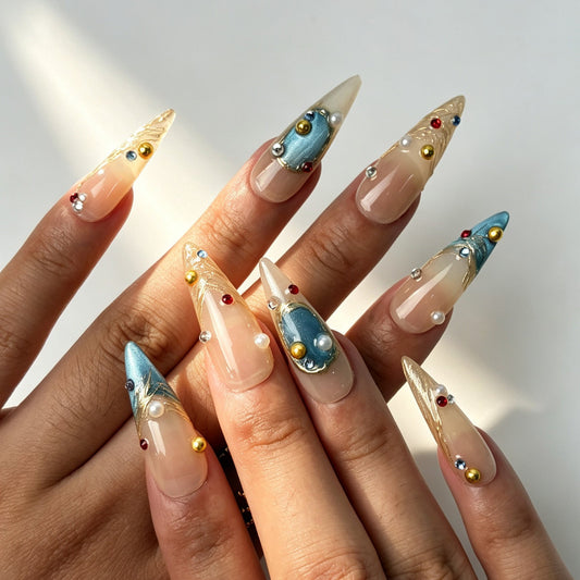 Aqua Gild textured stiletto press‑on nails on‑hand, evening party manicure