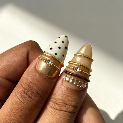 Gilded Dot rhinestone almond handmade press on nails on natural hand