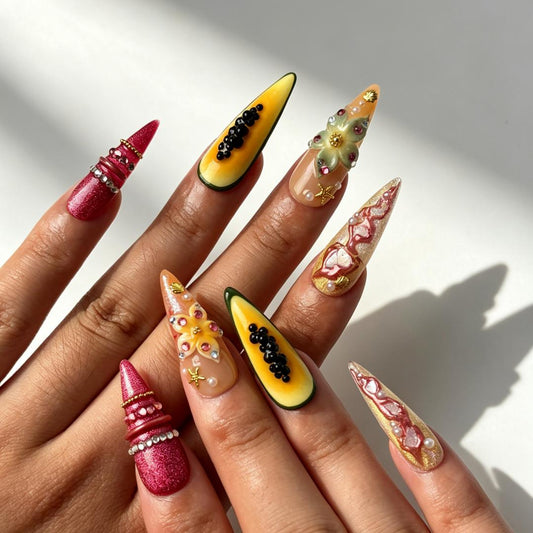 Papaya Bloom tropical stiletto press‑on nails hand manicure view