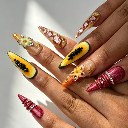 Papaya Bloom papaya fuchsia gradient long stiletto press on nails worn on hand, pink floral shell vintage party nail art