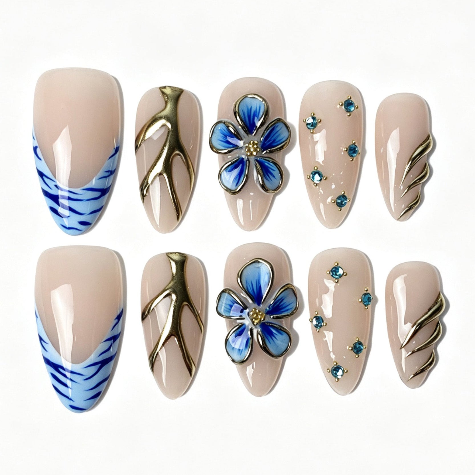 Porcelain‑style nude almond press on nails, blue zebra french fake nails with 3D blue floral and gold branch