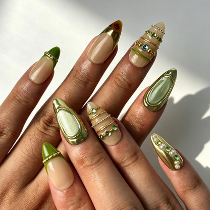 Sage Gilded cream nude sage green almond press on nails worn on hand, gilded gem elegant spring banquet nail art