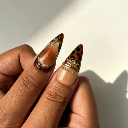 Luxurious stiletto press on nails, nude amber gradient, champagne glitter, tortoiseshell, gold chain, gold bead and brown leaf