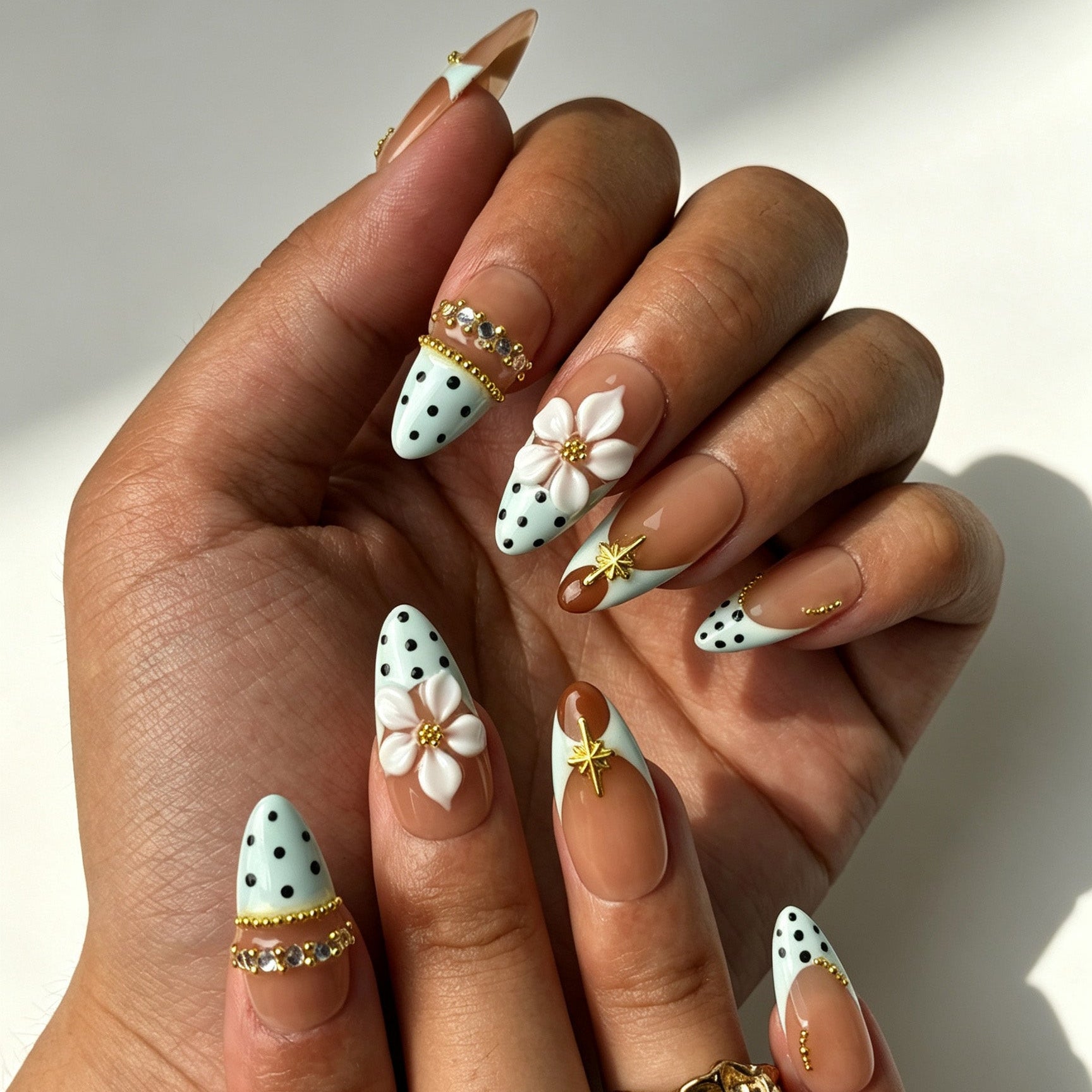 Close-up handmade press on nails 3D white petal flower rhinestone inlay golden bead decoration