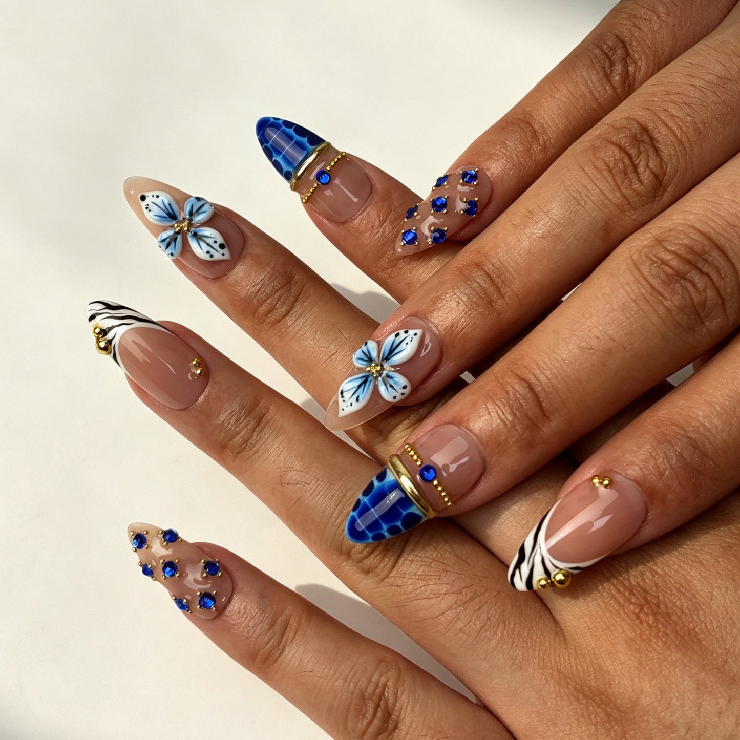 Blue Petal cool tone press on nails on hand fashion party manicure