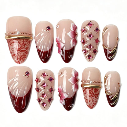 Medium almond wine red press on nails, red lace texture gradient 3D flower petal shell carving pink rhinestone golden line luxury fake nails