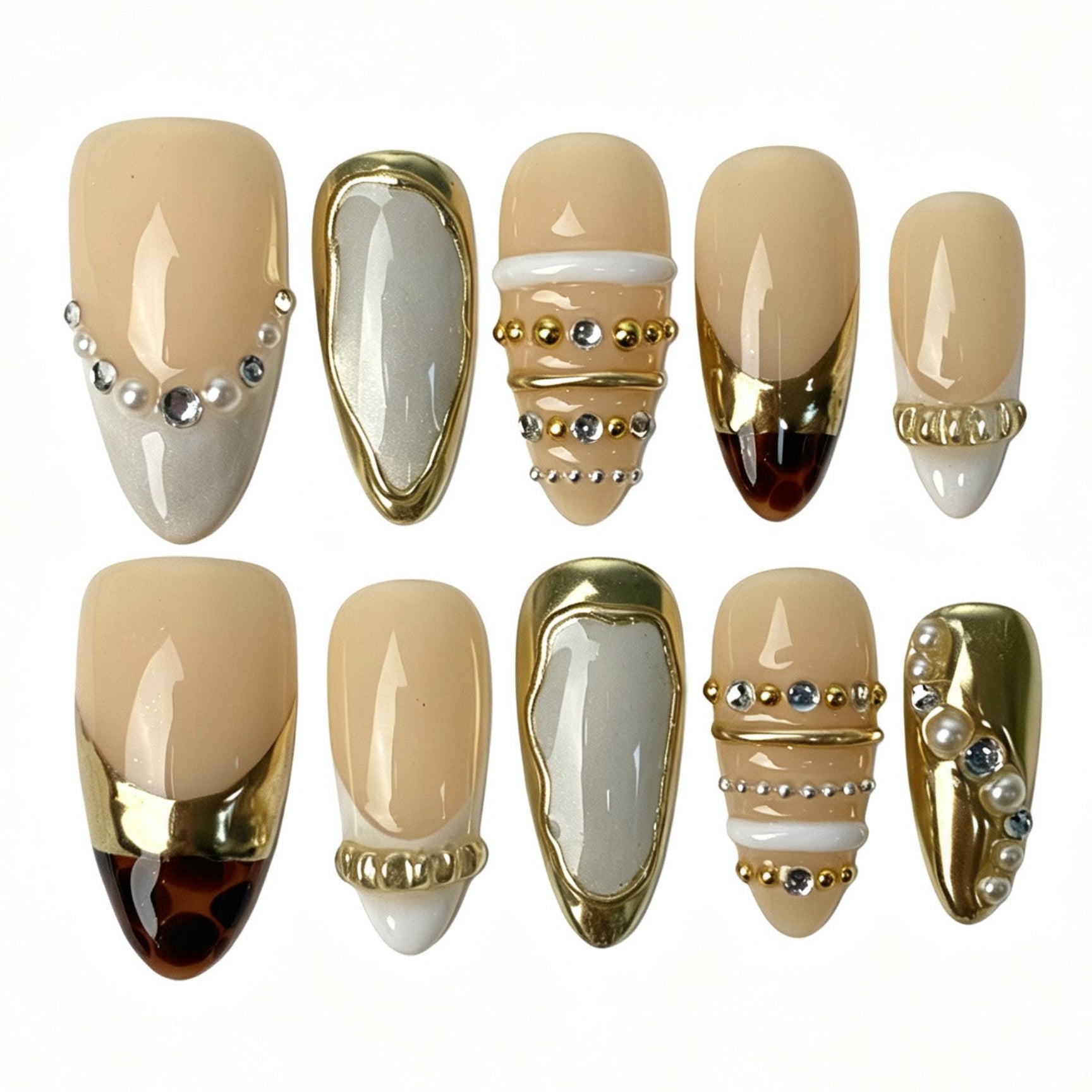 Medium almond nude press on nails, gold hollow frame tortoiseshell tip pearl rhinestone chain minimalist luxury fake nails