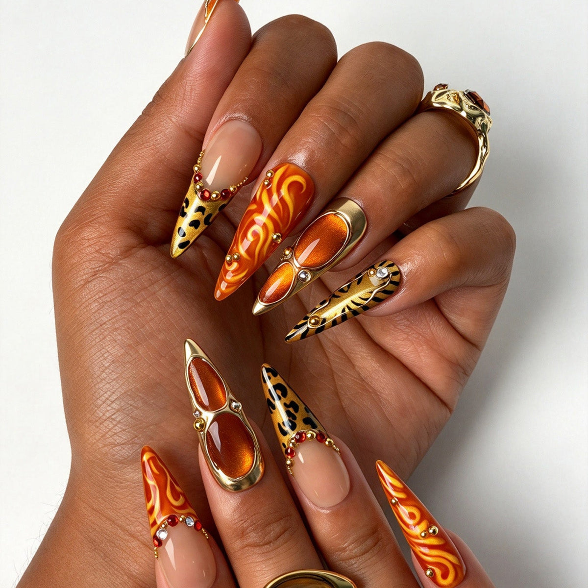 Handcrafted stiletto press on nails, bold safari orange flame nail design for party and night out